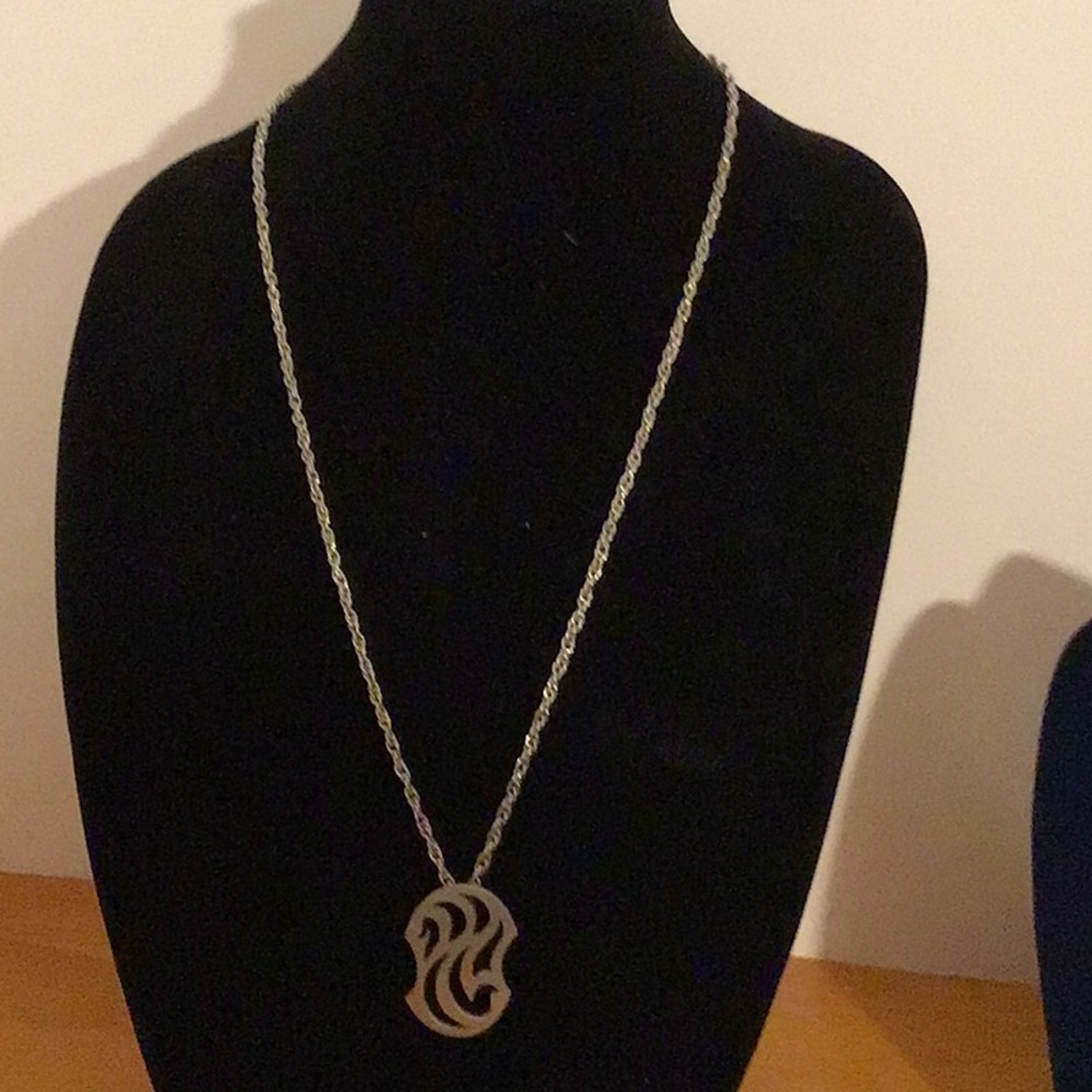 Vintage Kelly waters pewter pendant with chain.